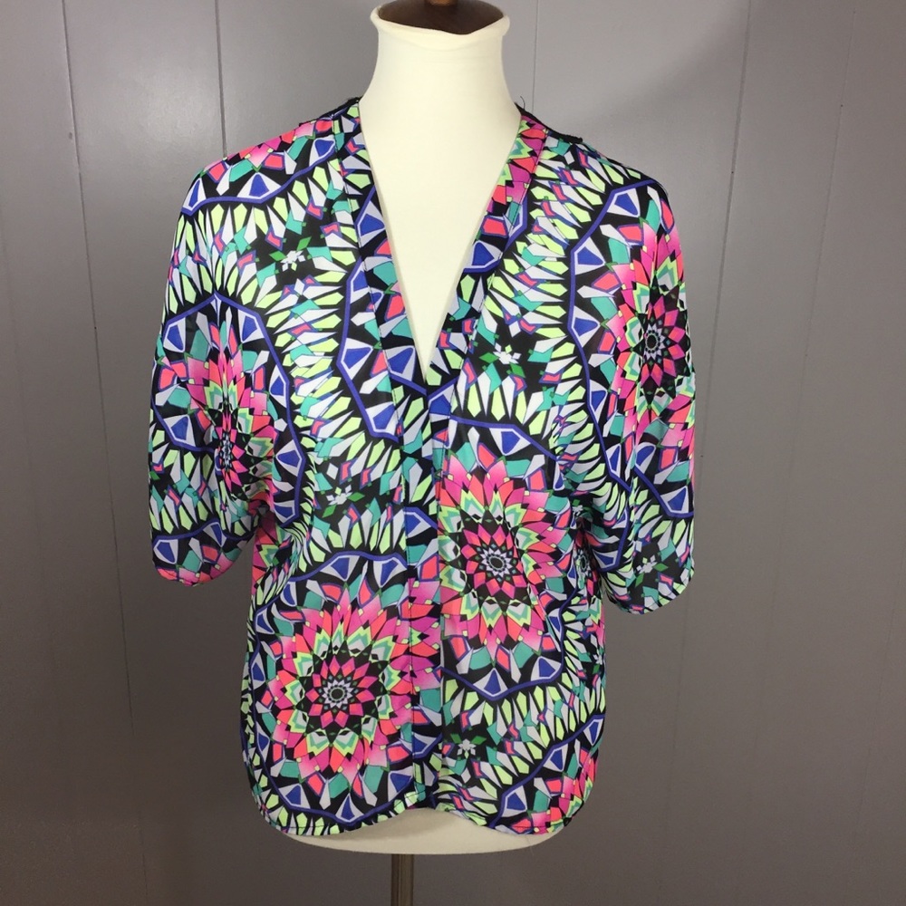 Neon colorful geometric sunburst print top